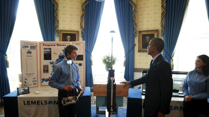 Obama speaks with Sonsteby and Peifer about their invention, as he plays host to the 2015 White House Science Fair at the White House in Washington