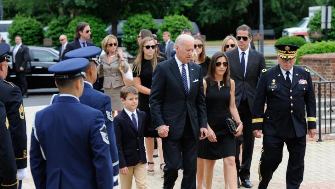Vice President Joe Biden and his family arrive for the viewing of former Delaware Attorney General Beau Biden at Legislative Hall before a viewing in Dover, Del. Biden, the vice president's eldest son, died of brain cancer Saturday at age 46.  (Jason Minto/The Wilmington News-Journal via AP)  NO SALES
