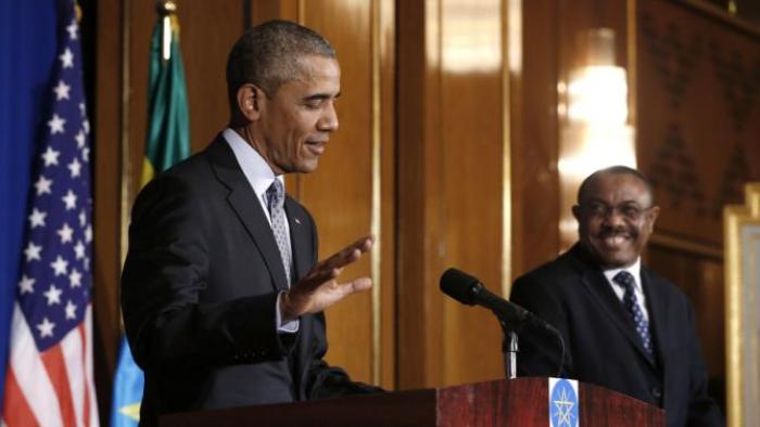 Ethiopia's Prime Minister Hailemariam Desalegn (R) smiles at comments by U.S. President Barack Obama (L) during their news conference at the National Palace in Addis Ababa, Ethiopia July 27, 2015. The economy of Ethiopia is forecast to expand by more than 10 percent, although rights groups say Addis Ababa's achievements are at the expense of political freedom. REUTERS/Jonathan Ernst