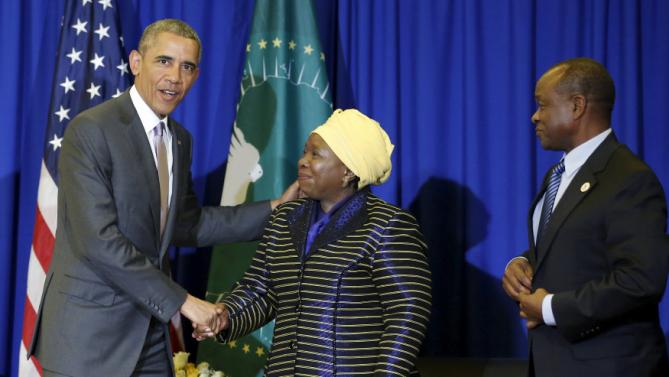 U.S. President Barack Obama (L) meets with African Union Chairperson Nkosazana Dlamini-Zuma (C) at the African Union in Addis Ababa, Ethiopia July 28, 2015. Obama toured a U.S.-supported food factory in Ethiopia on Tuesday on the last leg of an Africa trip, before winding up his visit at the African Union where he will become the first U.S. president to address the 54-nation body.  REUTERS/Jonathan Ernst