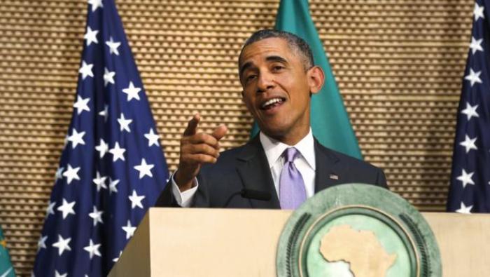 U.S. President Barack Obama talks about presidential term limits during remarks at the African Union in Addis Ababa, Ethiopia July 28, 2015. Obama said on Tuesday that democracy in Africa was threatened when presidents did not stand aside at the end of constitutional term limits and pointed to violence in Burundi where the president has secured a third term.  REUTERS/Jonathan Ernst