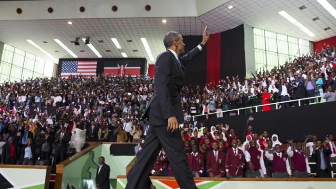President Barack Obama waves after delivering a speech at Safaricom Indoor Arena, on Sunday, July 26, 2015, in Nairobi. On the final day of his visit in Kenya, Obama laid out his vision for Kenya's future, and broad themes of U.S.-Kenya relations. (AP Photo/Evan Vucci)