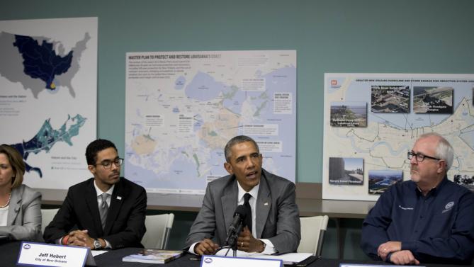 President Barack Obama participates in a roundtable on Hurricane Katrina at the Andrew P. Sanchez Community Center in New Orleans, Thursday, Aug. 27, 2015, while visiting for the 10th anniversary since the devastation of Hurricane Katrina. The roundtable highlighted advancements in national preparedness, showcase Gulf Coast resiliency, mark the achievements of the New Orleans community over the past 10 years with opportunities to build future resilience.(AP Photo/Andrew Harnik)