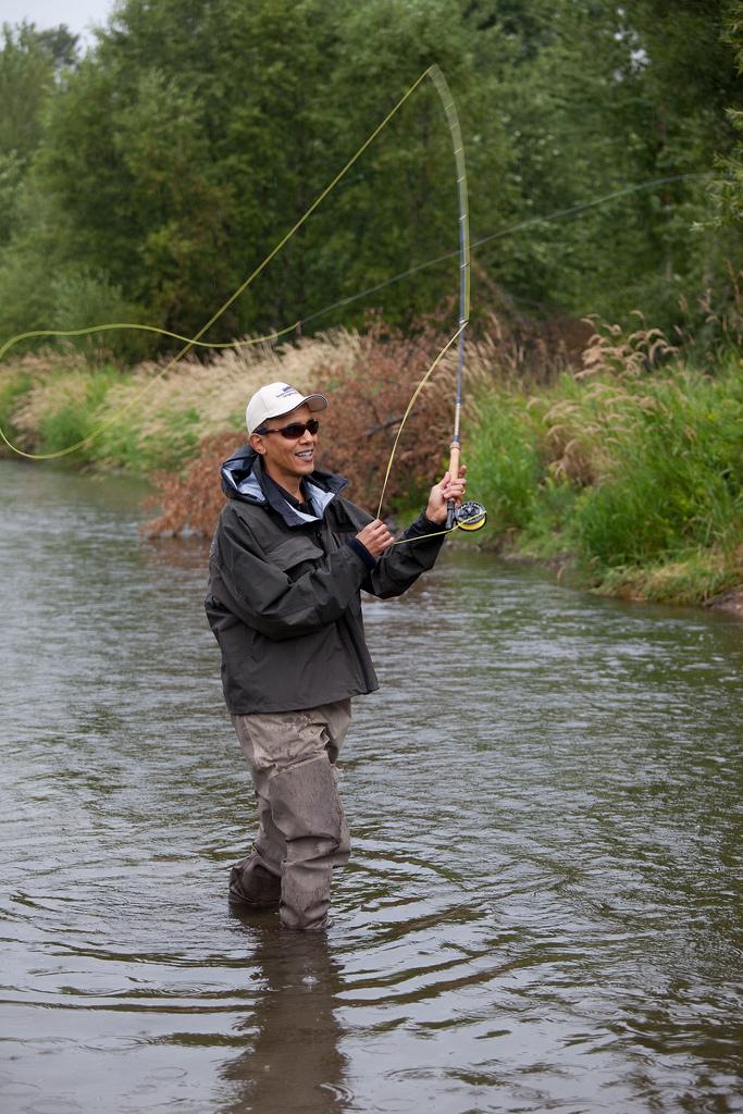 President Barack Obama casts his line while fishing for trout on the East Gallatin River near Belgrade, Mont., August 14, 2009. The President hooked about 6 fish, but did not land any during his first fly fishing outing. (Official White House photo by Pete Souza) This official White House photograph is being made available only for publication by news organizations and/or for personal use printing by the subject(s) of the photograph. The photograph may not be manipulated in any way and may not be used in commercial or political materials, advertisements, emails, products, promotions that in any way suggests approval or endorsement of the President, the First Family, or the White House.