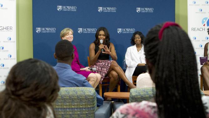 First lady Michelle Obama speaks to students during her visit to a career and technical training program at Howard Community College as part of her 'Reach Higher' initiative, Thursday, Sept. 17, 2015, in Columbia, Md., Thursday, Sept. 17, 2015. (AP Photo/Jose Luis Magana) .