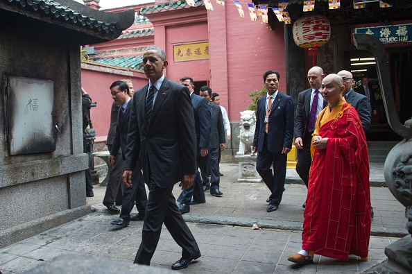 US President Barack Obama (L) walks with Abbot of the Jade Emperor Pagoda Thich Minh Thong (R) during a visit to the Jade Pagoda in Ho Chi Minh City on May 24, 2016. US President Barack Obama told communist Vietnam on May 24 that basic human rights would not jeopardise its stability, in an impassioned appeal for the one-party state to abandon authoritarianism. / AFP / JIM WATSON (Photo credit should read JIM WATSON/AFP/Getty Images)