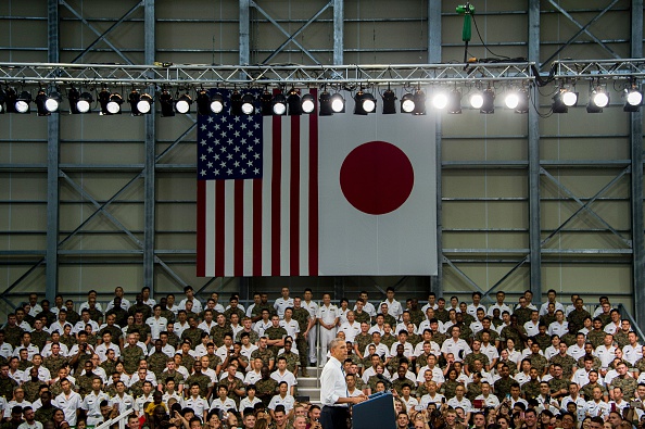 US President Barack Obama speaks with Us and Japanese troops at Marine Corps Air Station Iwakuni on May 27, 2016. Obama, who arrived at Iwakuni after attending the G7 Summit in central Japan, hailed the "great alliance" between the United States and Japan on May 27, just hours ahead of his historic visit to Hiroshima. / AFP / JIM WATSON (Photo credit should read JIM WATSON/AFP/Getty Images)