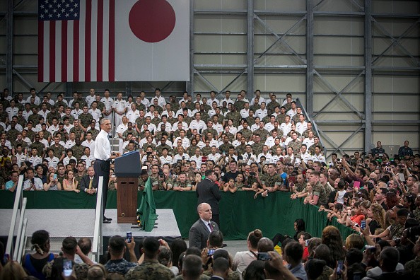 IWAKUNI, JAPAN - MAY 27: U.S. President Barack Obama (L) gives a speech to the U.S. and Japanese servicemen and their families at the Marine Corps Air Station Iwakuni (MCAS Iwakuni) on May 27, 2016 in Iwakuni, Japan. President Obama flew in to the MCAS Iwakuni on Air Force One, and visited the troops before visiting Hiroshima. (Photo by Jean Chung/Getty Images)