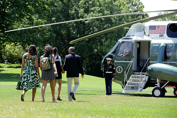 WASHINGTON, DC - JUNE 17: (L-R) U.S. first lady Michelle Obama, daughters Sasha Obama and Malia Obama, and President Barack Obama leave the White House before boarding Marine One on the South Lawn June 17, 2016 in Washington, DC. The first family is traveling to New Mexico and tour Carlsbad Caverns National Park to celebrate the 100th anniversary of the creation of America's national park system. (Photo by Chip Somodevilla/Getty Images)