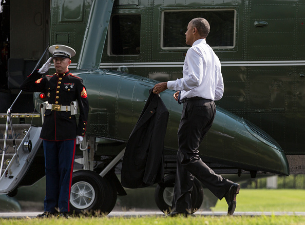 BETHESDA, MD - JUNE 21: (AFP OUT) U.S. President Barack Obama walks to Marine One after visiting wounded service members at Walter Reed National Military Medical Center on June 21, 2016 in Bethesda, MD. (Photo by Joshua Roberts - Pool/Getty Images)