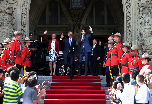 Sophie Gregoire-Trudeau, from center left U.S. President Barack Obama, and Justin Trudeau, Canada's prime minister, greet school children outside of Parliament Hill after the North American Leaders Summit (NALS) in Ottawa, Ontario, Canada, on Wednesday, June 29, 2016. Leaders from the three Nafta nations "agree on the need for governments of all major steel-producing countries to make strong and immediate commitments to address the problem of global excess steelmaking capacity," according to a statement from Trudeau. Photographer: Cole Burston/Bloomberg via Getty Images
