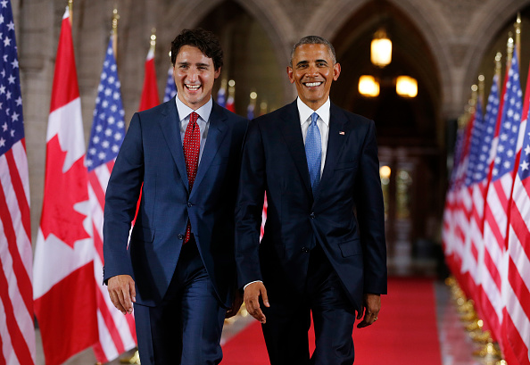 Prime Minister of Canada Justin Trudeau (L) and US President Barack Obama exit the Hall of Honour on Parliament Hill following the North American Leaders Summit in Ottawa, June 28, 2016. / AFP / Chris Roussakis (Photo credit should read CHRIS ROUSSAKIS/AFP/Getty Images)