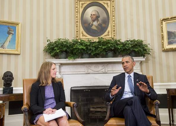 US President Barack Obama, alongside Secretary of Health and Human Services Sylvia Mathews Burwell, speaks about the response and precautions to take for the Zika virus, during a meeting in the Oval Office of the White House in Washington, DC, July 1, 2016. / AFP / SAUL LOEB (Photo credit should read SAUL LOEB/AFP/Getty Images)