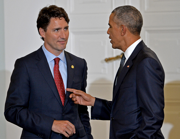 Canadian Prime Minister Justin Trudeau (L) talks with US President Barack Obama during a working dinner at the Presidential Palace during the NATO Summit in Warsaw on July 8, 2016. The Polish capital Warsaw hosts a two-day top-level NATO meeting, first time since Poland joined the alliance in 1999. / AFP / JANEK SKARZYNSKI (Photo credit should read JANEK SKARZYNSKI/AFP/Getty Images)